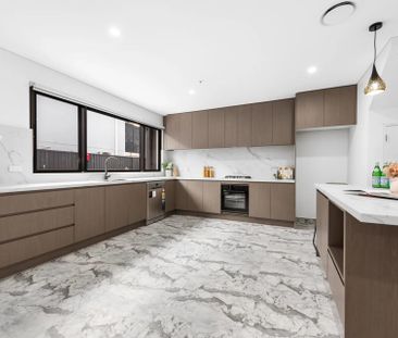 Brand-New Four-Bedroom Townhouse in Prime Location - Photo 4