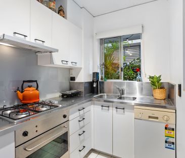 Premium Inner City Living with Rare Dual Courtyard Design - Photo 4