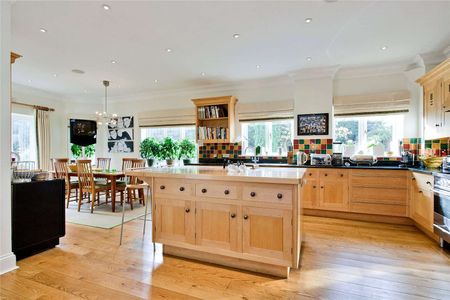 Situated in grounds of just over half an acre and located in one of Esher's most sought after private roads close to High Street. - Photo 5