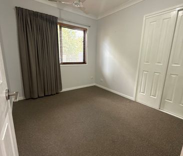 Tidy single storey home on spacious corner block close to Robina Sh... - Photo 5