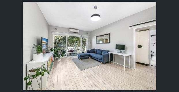 Stylish Two-Bedroom Apartment with Stunning Water Views - Photo 1