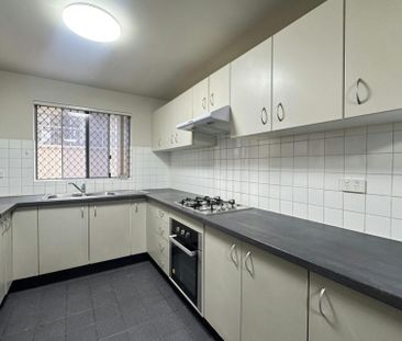 TWO STOREY TOWNHOUSE STYLE APARTMENT - Photo 1