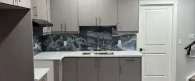 Spacious 2-Bedroom Basement Suite with In-Suite Laundry in Livingston | Calgary - Photo 1