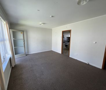 Inviting two-bedroom unit tucked away from the main road down a ser... - Photo 3