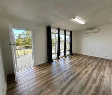 FRESHLY UPDATED HOME IN A FAMILY-FRIENDLY LOCATION - Photo 2