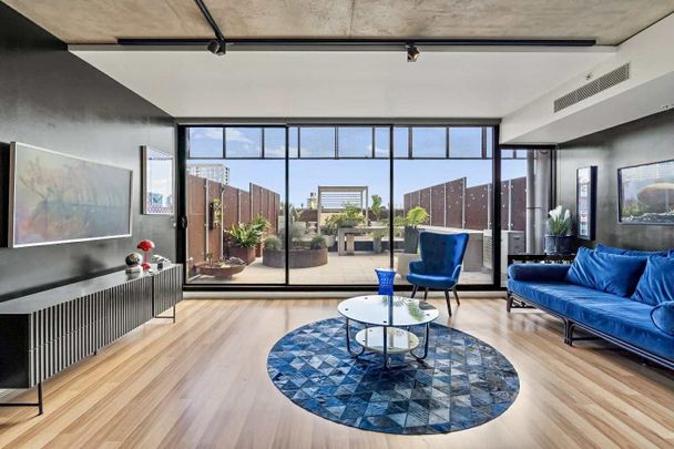 Fully Furnished Gem with Spacious Balcony & Entertaining Space - Photo 1