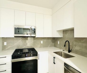 New Condo in Surrey – Top Floor! - Photo 1