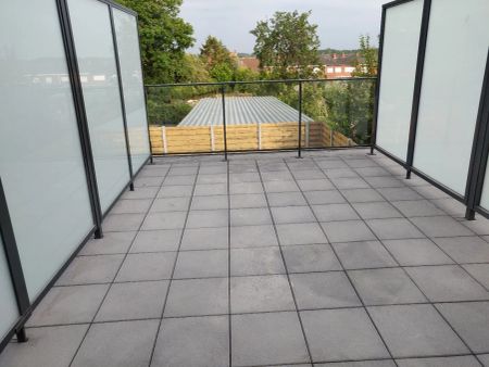 Recent tweeslaapkamer appartement met carport in centrum Beselare - Photo 3