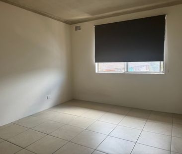 RENOVATED 2 BEDROOM UNIT - Photo 2