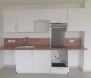 location Appartement T2 DE 52.65m² À GEX - Photo 3