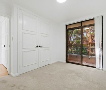 Recently Renovated Three-Bedroom Unit - Photo 3