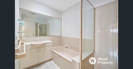 Light-Filled Coastal Retreat in a Prime Hampton Location - Photo 4