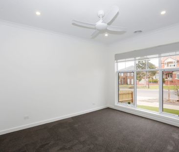 Stunning 4-Bedroom Home in South Morang - Photo 4