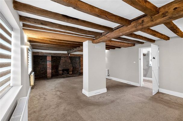 A detached farmhouse with a connected annexe, outbuildings (including stables) and three paddocks in Hanch. - Photo 1