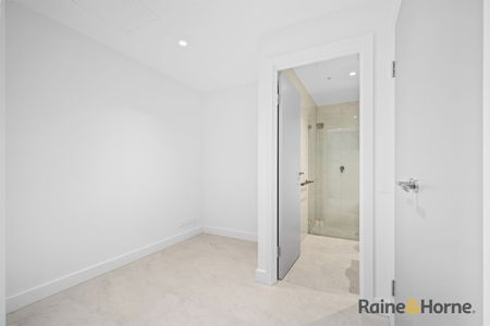 Near-New Luxury 2 Bedroom Apartment in the Heart of Rhodes Central - Photo 2