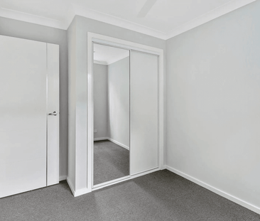 Quality Home with Private Deck & Secure Yard - Photo 2