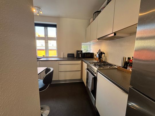 Lys 2-værelses lejlighed i Øgadekvarteret nær centrum - Foto 1