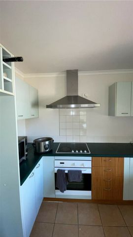 WELL PRESENTED BRICK AND TILE HOME - Photo 4