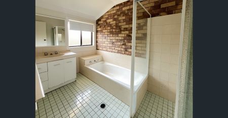 CONVENIENTLY LOCATED TOWNHOUSE - Photo 2