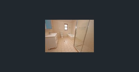 Recently renovated 4BR/2Bath Brick home, 3 Car fenced port. Walk to Train & Westfield. - Photo 3