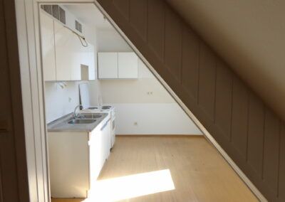 Helle, gepflegte 1 Zimmer Wohnung mit möblierter Küche - Foto 3