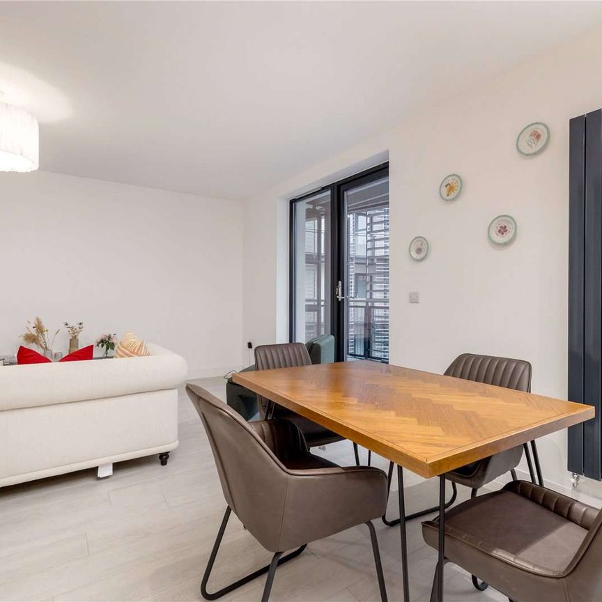 A bright and spacious two bedroom apartment with balcony and parking space in the desirable Old Town area of Edinburgh. - Photo 1