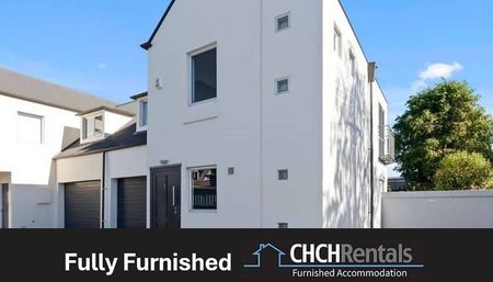 Fully Furnished 2 - 3 Bedroom City Townhouse with Internal Access Garage! - Photo 2