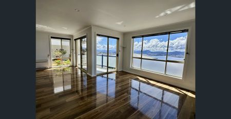 Sunny and Spacious with Panoramic River Derwent Views - Photo 3