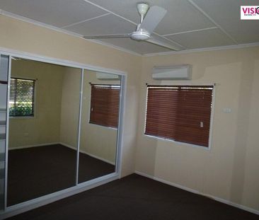 Charming 3-Bedroom Home Close to CBD with Spacious Yard & Powered Shed - Photo 6