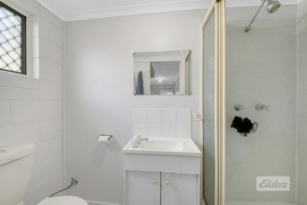 THIS PROPERTY OFFERS LOW MAINTENANCE LIVING WITH A SPACIOUS YARD , PRACTICAL LAYOUT AND SOLAR! - Photo 1