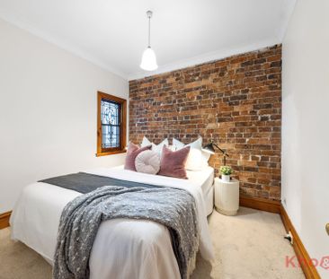 Character-Filled 2 Bedroom Terrace with Attic & Basement - Photo 6