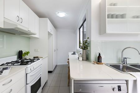 Classic terrace charm in a vibrant village setting - Photo 5