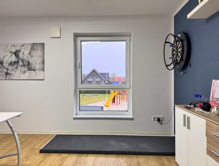 Einziehen & wohlfühlen: Doppelhaushälfte mit EBK, Südterrasse und Carport in Augustfehn - Foto 2