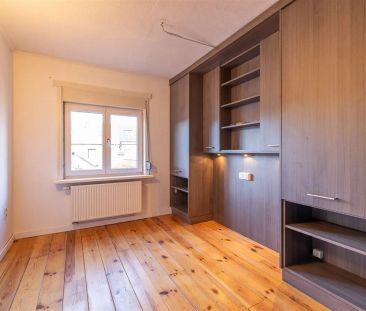 Stadswoning met drie slpk en tuintje op gunstige locatie te Aarschot - Photo 2