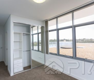 North facing 2 Bedroom + Study City View Penthouse with 2 Car Spaces - Photo 2