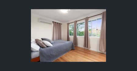 Family Living with Pool & Entertaining Deck in Stafford Heights - Photo 4