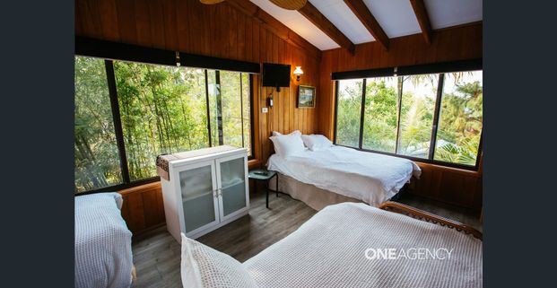 PRIVATE COASTAL OASIS WITH PANORAMIC WATER VIEWS - Photo 1