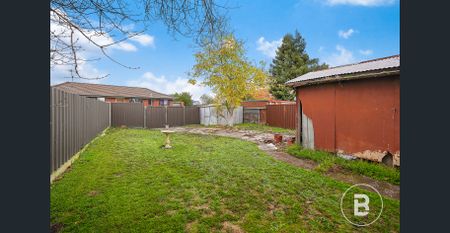 PRACTICAL THREE-BEDROOM BRICK HOME WITH REAR ACCESS - Photo 4