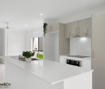 Your beautiful 4-bedroom home awaits! - Photo 6