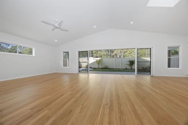 Brand New Architectural Coastal Oasis with Dual-Living Flexibility - Photo 1