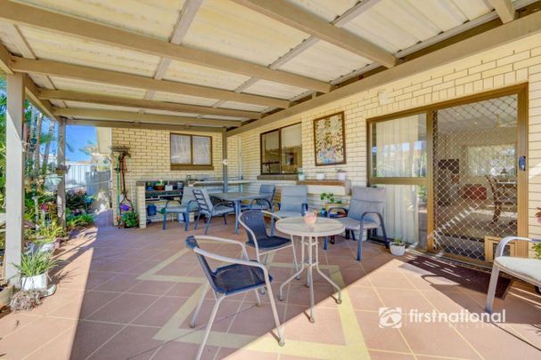 IMMACULATE BRICK HOME WITH SOLAR IN AVENELL HEIGHTS - Photo 1