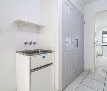 WELCOME TO 25 BAUHINIA STREET - WHERE COASTAL COMFORT MEETS EVERYDA... - Photo 3