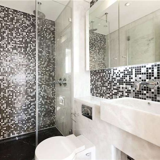 A modern 2 bedroom penthouse situated on the 21st floor of this striking residential development located close to the heart of Canary Wharf’s financial district. - Photo 1