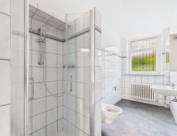 Helle 3-Zimmer Souterrainwohnung mit Balkon in zentraler Wohnlage von Plauen - Foto 1