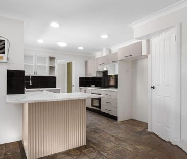 RENOVATED FOUR BEDROOM HOME - Photo 1