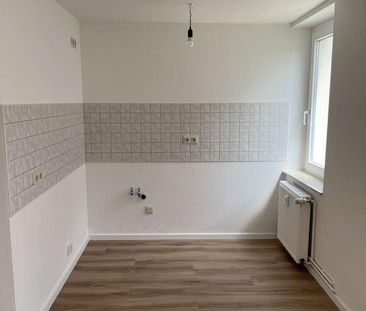 Gepflegte 2-Zimmer-Wohnung mit Einbauküche in ruhigem Bauckauer Hin... - Photo 4