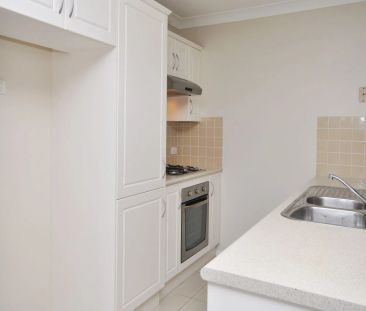 Easy Care Living - Photo 1