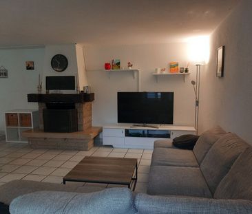 Appartement de 5,5 pièces rez-de-chaussée avec terrasse - Photo 1