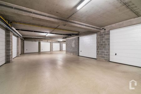 Ruim gelijkvloers appartement met eigen tuin - Foto 2