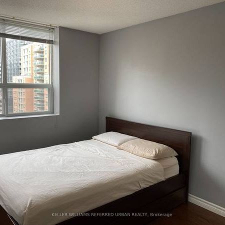 Very spacious modern feel + den parking included! - Photo 1